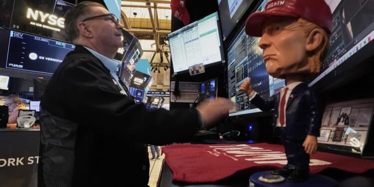 White House claims 'a lot of progress' on trade as IMF cuts growth forecast