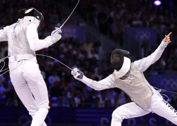Female Fencer Bravely Takes Knee, Forfeits Against Trans Opponent In Protest