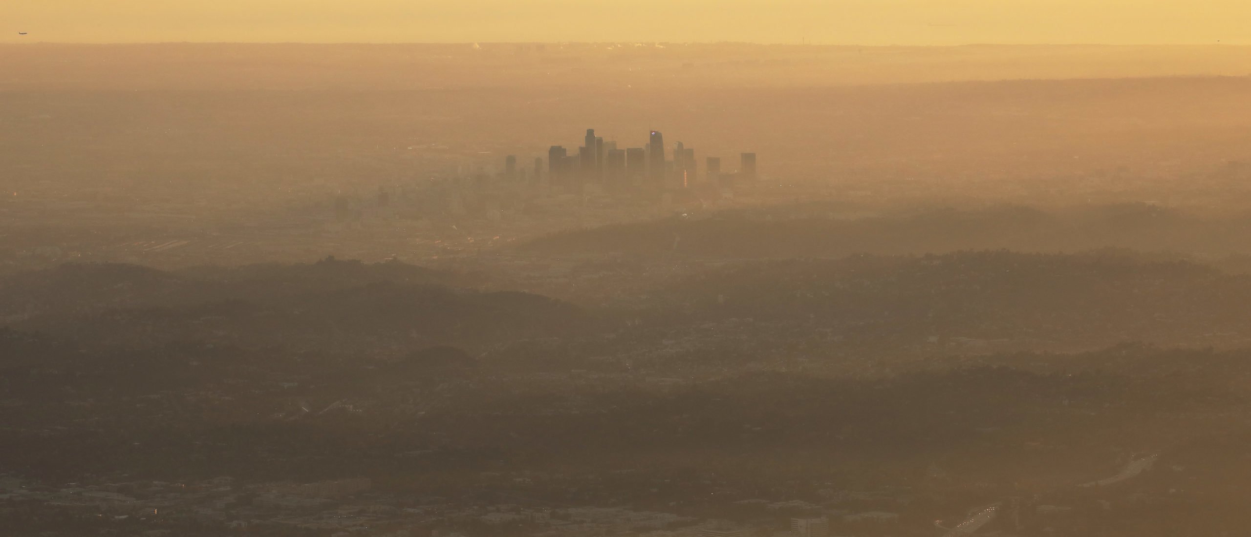 The buildings of downtown Los Angeles are partially obscured in the late afternoon on November 5, 2019 as seen from Pasadena, California. (Photo by Mario Tama/Getty Images)