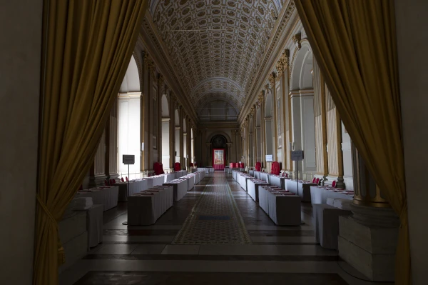 The Vatican’s Hall of Blessings awaits for the arrival of the conclave to elect the next pope, Tuesday, May 6, 2025. Credit: Vatican Media