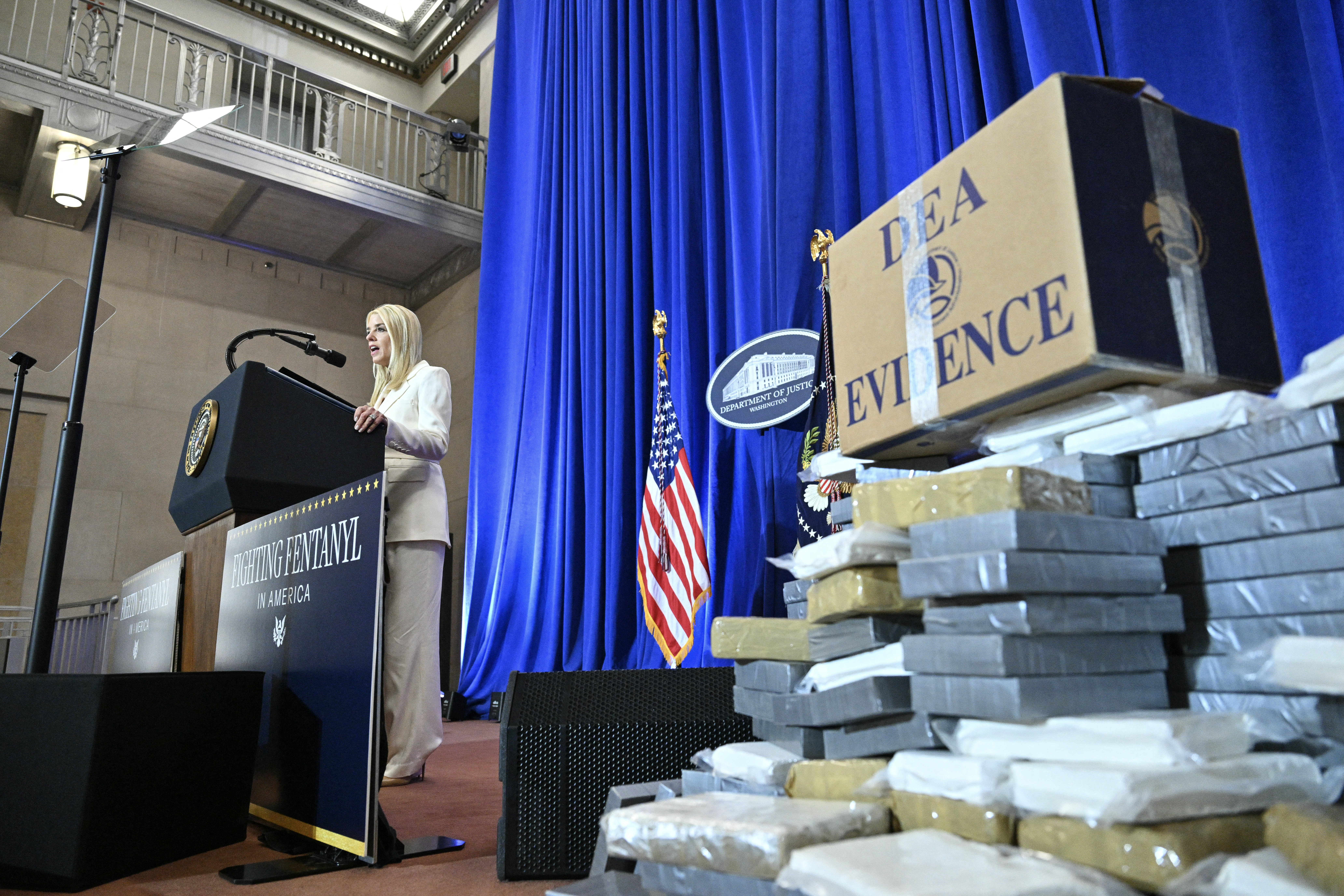 US Attorney General Pam Bondi speaks at the Department of Justice in Washington, DC, on March 14, 2025. (Photo by ROBERTO SCHMIDT / AFP) (Photo by ROBERTO SCHMIDT/AFP via Getty Images)