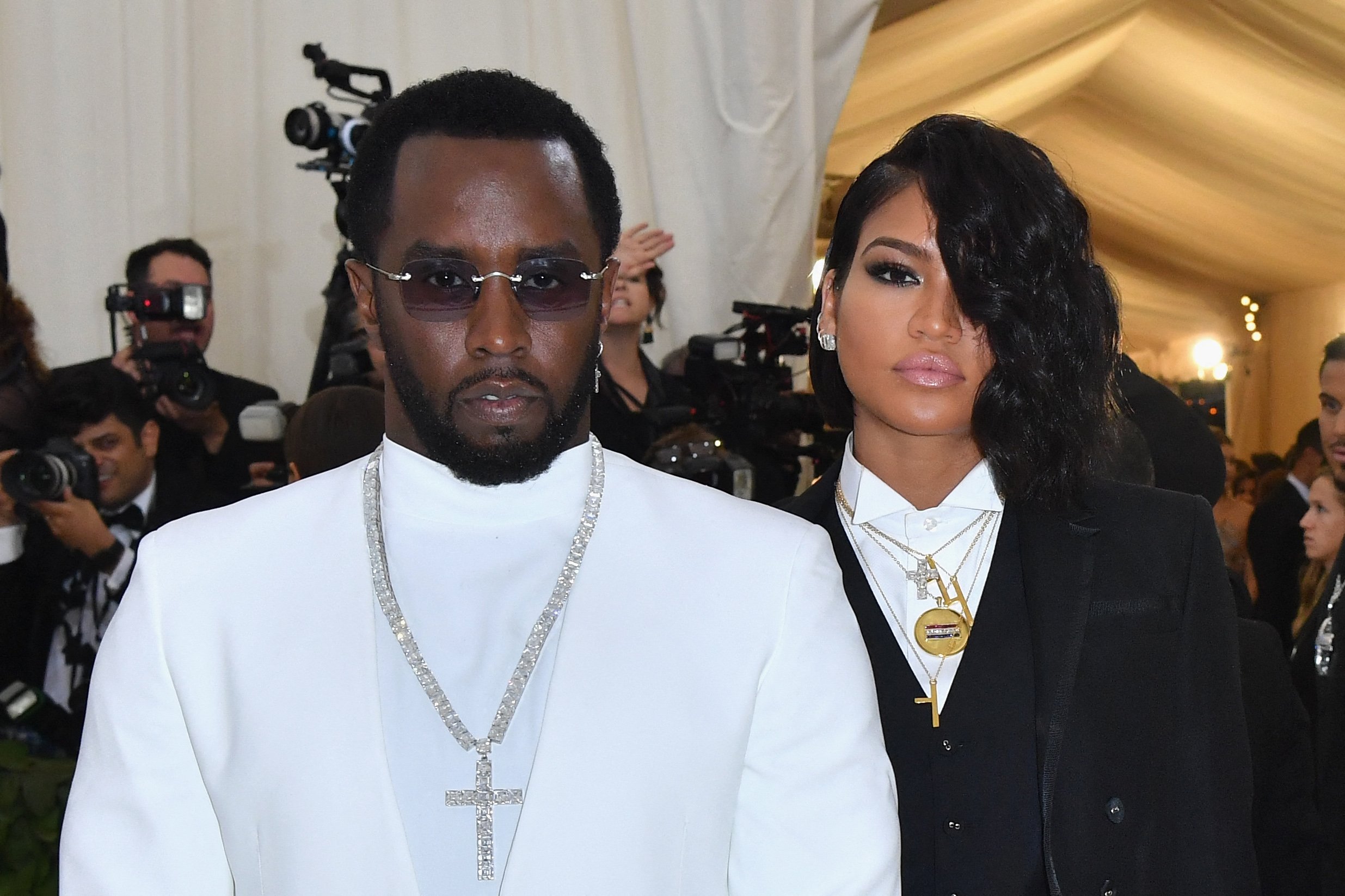 Sean Combs (L) and singer Cassie Ventura arrives for the 2018 Met Gala on May 7, 2018, at the Metropolitan Museum of Art in New York. The Gala raises money for the Metropolitan Museum of Arts Costume Institute. The Gala's 2018 theme is Heavenly Bodies: Fashion and the Catholic Imagination. (Photo by ANGELA WEISS / AFP) (Photo by ANGELA WEISS/AFP via Getty Images)