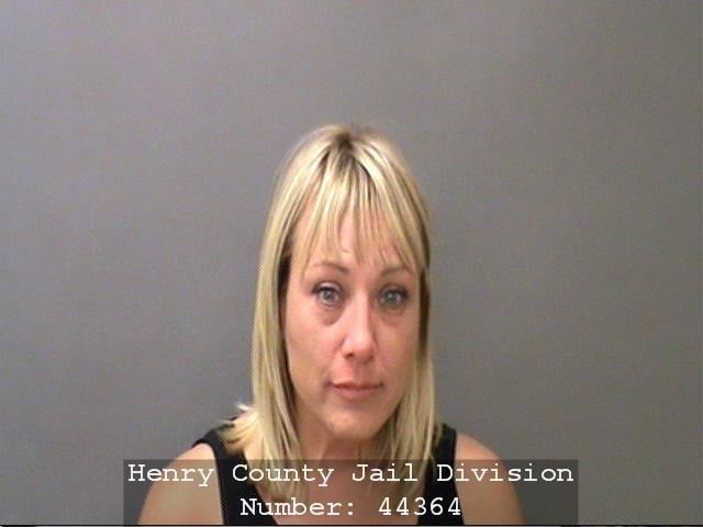 IRS spokesperson Jodie Reynolds poses for a mug shot at the Henry County Jail in October 2015 in Knightstown, Indiana. (Photo courtesy of Henry County)