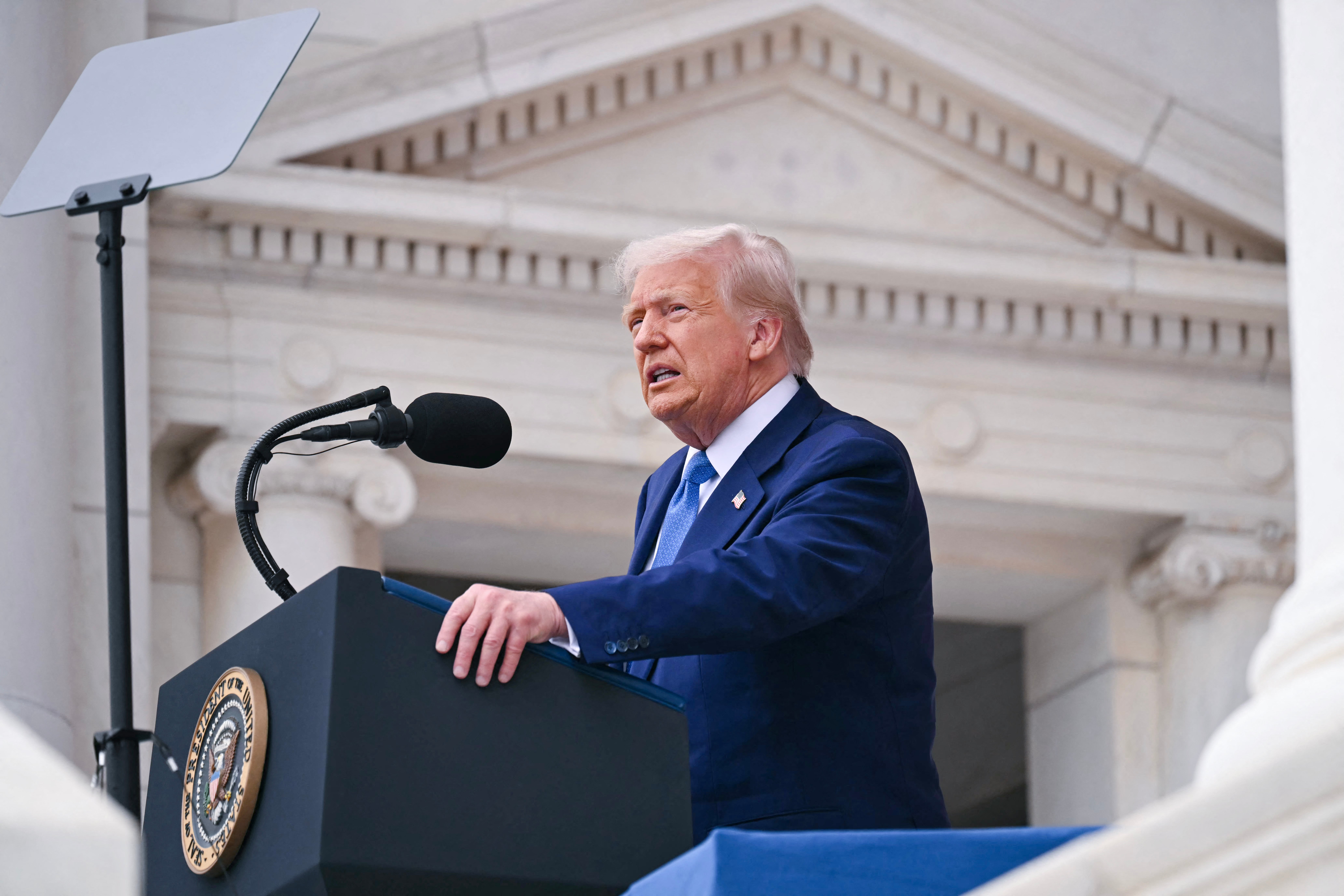 US President Donald Trump delivers remarks at the National Memorial Day Observance at the Memorial Amphitheatre in Arlington National Cemetery in Arlington, Virginia, on May 26, 2025. (Photo by SAUL LOEB/AFP via Getty Images)
