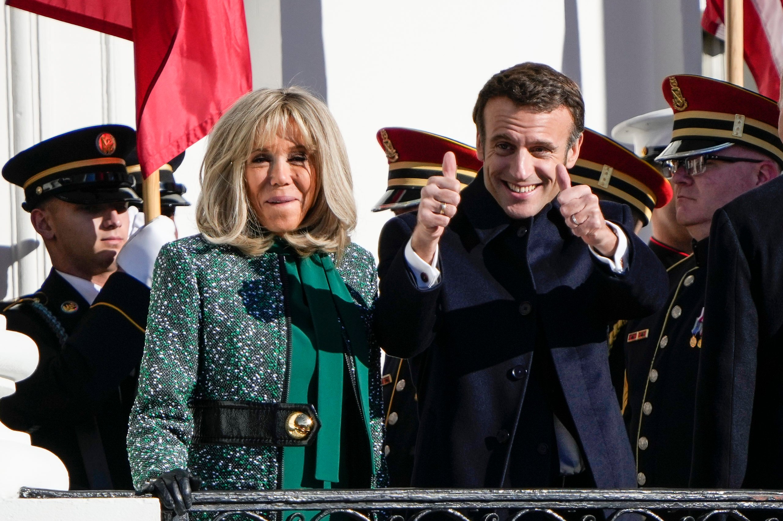 WASHINGTON, DC - DECEMBER 1: French President Emmanuel Macron and his wife Brigitte Macron react to the crowd on the South Lawn of the White House during an official state visit on December 01, 2022 in Washington, DC. President Biden is welcoming Macron for the first official state visit of the Biden administration. (Photo by Drew Angerer/Getty Images)