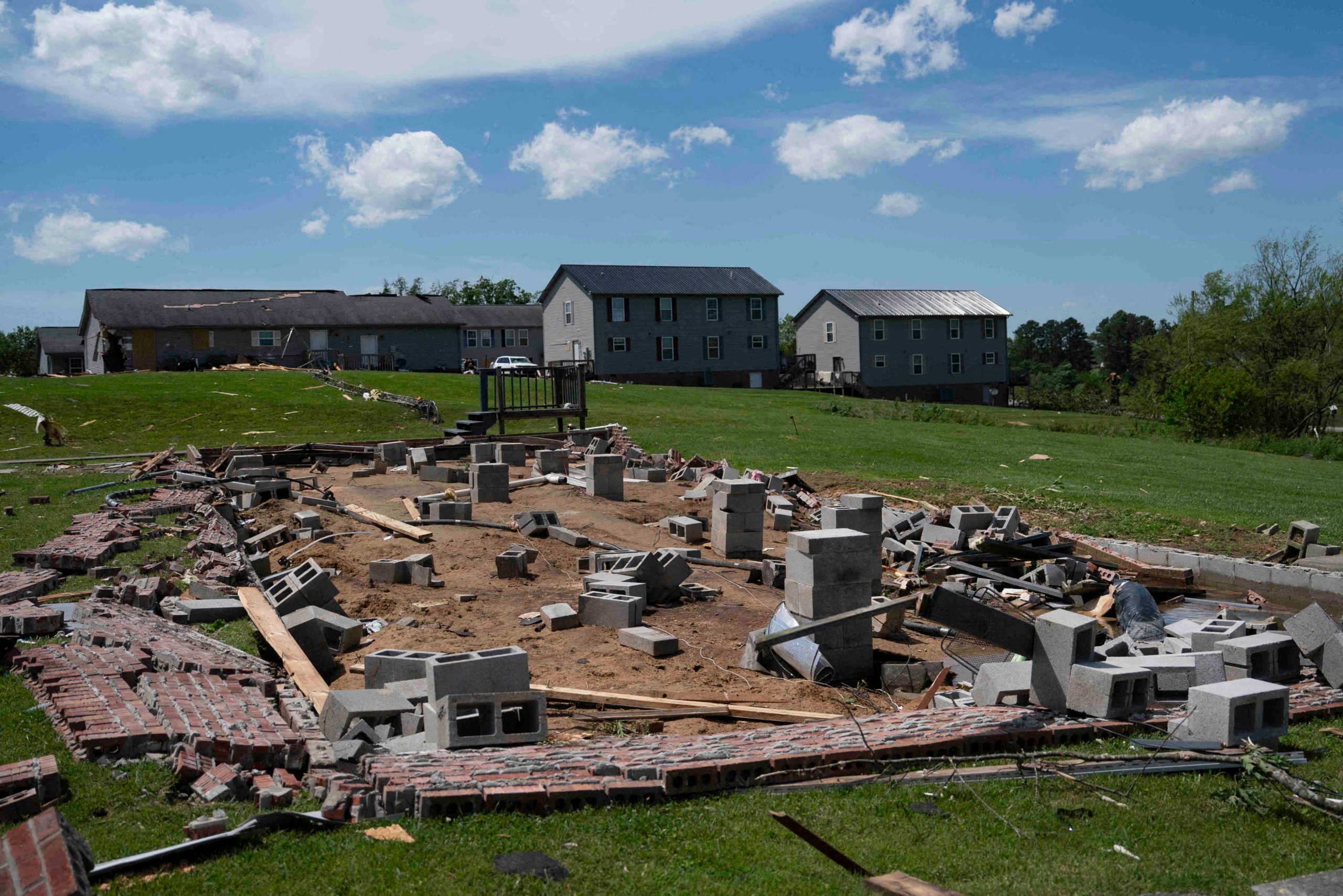 Damage from a tornado is seen in London, Kentucky, on May 17, 2025. More than 20 people have died after severe storms swept through the southern US states of Missouri and Kentucky, officials and local media reports said May 17, 2025. Kentucky governor Andy Beshear said on X that at least 14 people had died in Friday night's storms. At least seven people were killed in Missouri, the Washington Post reported. (Photo by Allison Joyce / AFP) (Photo by ALLISON JOYCE/AFP via Getty Images)