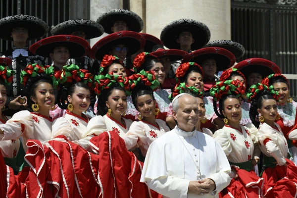 Pope Leo XIV poses with visitors at the general audience in St. Peter's Square on Wednesday, June 4. 2025. Credit: Vatican Media