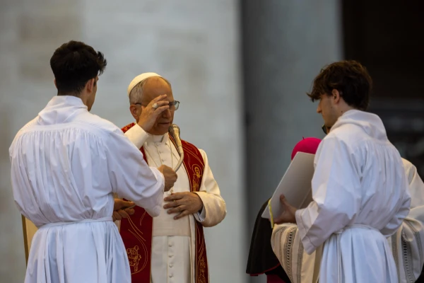 Pope Leo XIV leads a blessing at a Pentecost prayer vigil in St. Peter's Square, Saturday, June 7, 2025. Credit: Daniel Ibáñez/CNA