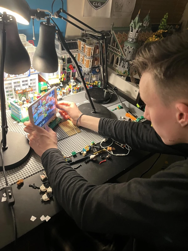 Brothers Louis, Iosaf, and Oliver Flynn, ages 16, 14, and 18, from Kilcornan in County Limerick, Ireland, have been making Lego movies since 2015 when they got their hands on an iPad mini. Youngest brother Iosaf’s job is to build the sets and narrate, while Louis and Oliver plan, animate, and do the filming. Credit: Photo courtesy of the Flynn family