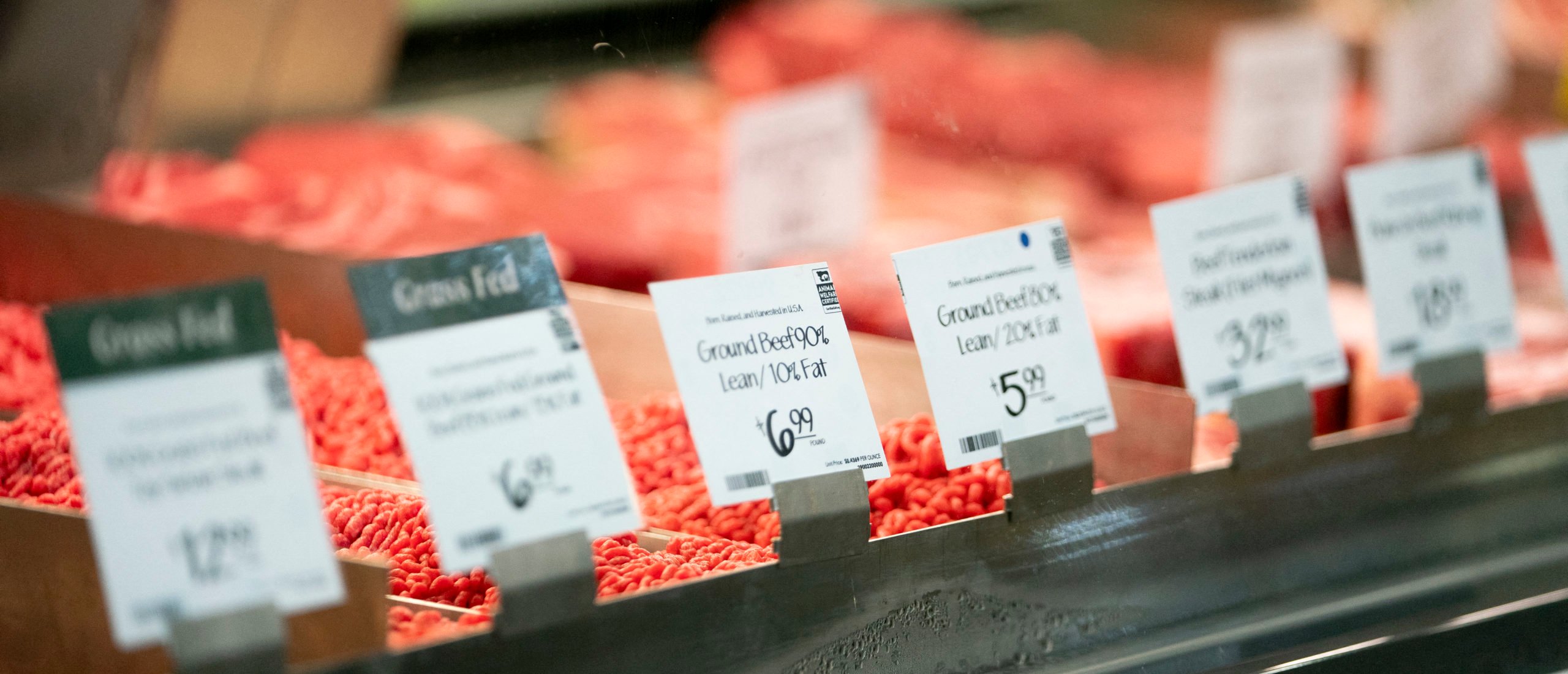 Price stickers for ground beef are displayed at a grocery store in Washington, DC, on June 14, 2022. (Photo by STEFANI REYNOLDS/AFP via Getty Images)