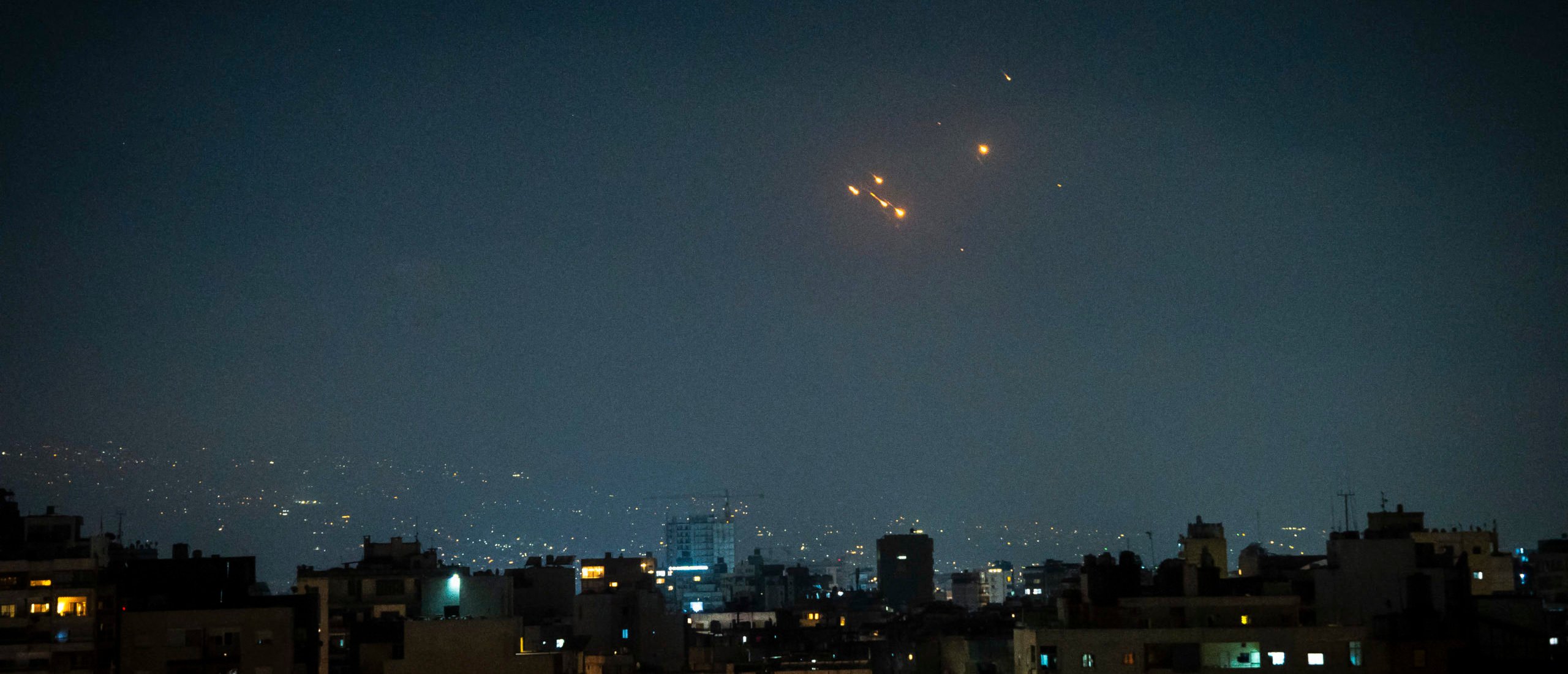 Iranian missiles face off Israeli interceptive missiles over Beirut, Lebanon, on June 13, 2025. (Photo by NAEL CHAHINE/Middle East Images/AFP via Getty Images)