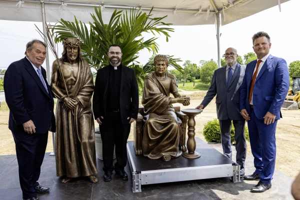 Jerry Lundergan (left) and others pose with statutes of Christ and Pontius Pilate in Maysville, Kentucky, Tuesday, June 3, 2025. Credit: Tammie Brown Photography