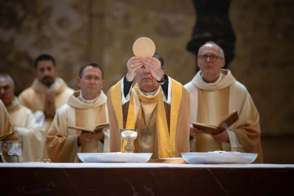 Cardinal Christophe Pierre, the papal nuncio to the United States, lifts the hosts during the consecration at a Mass at the Cathedral of Our Lady of the Angels in Los Angeles, Californa, marking the feast of Corpus Christi and the conclusion of the 2025 National Eucharistic Pilgrimage. Credit: Jeffrey Bruno/EWTN
