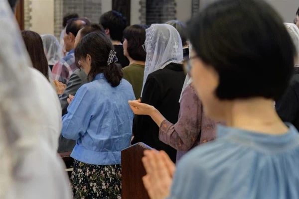 The faithful pray for peace and reconciliation on the Korean Peninsula at Myeongdong Cathedral in Seoul for the