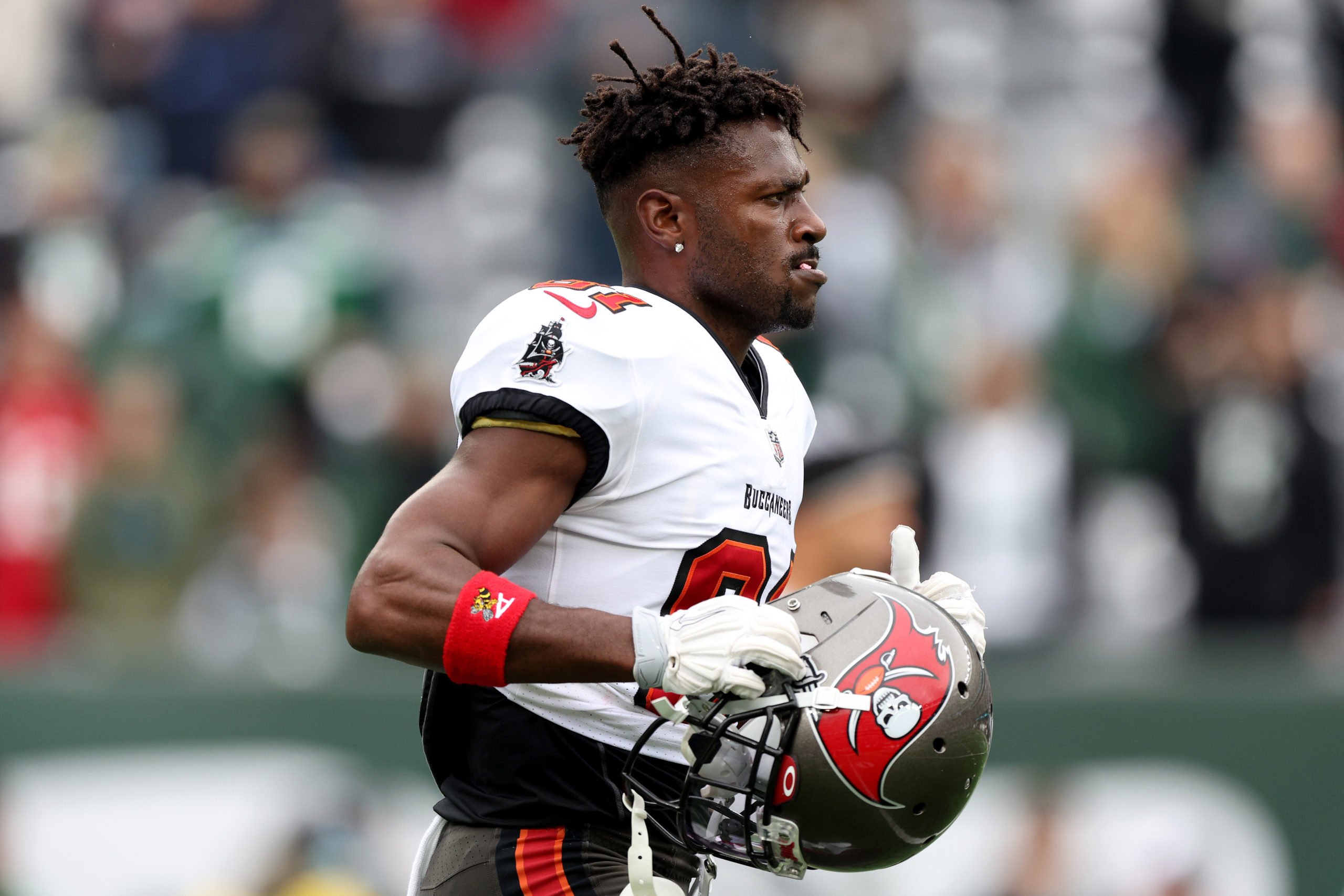 EAST RUTHERFORD, NEW JERSEY - JANUARY 02: Antonio Brown #81 of the Tampa Bay Buccaneers looks on against the New York Jets during the game at MetLife Stadium on January 02, 2022 in East Rutherford, New Jersey. (Photo by Elsa/Getty Images)