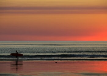 Surfing priest in Australia makes second ocean rescue, saving father and son