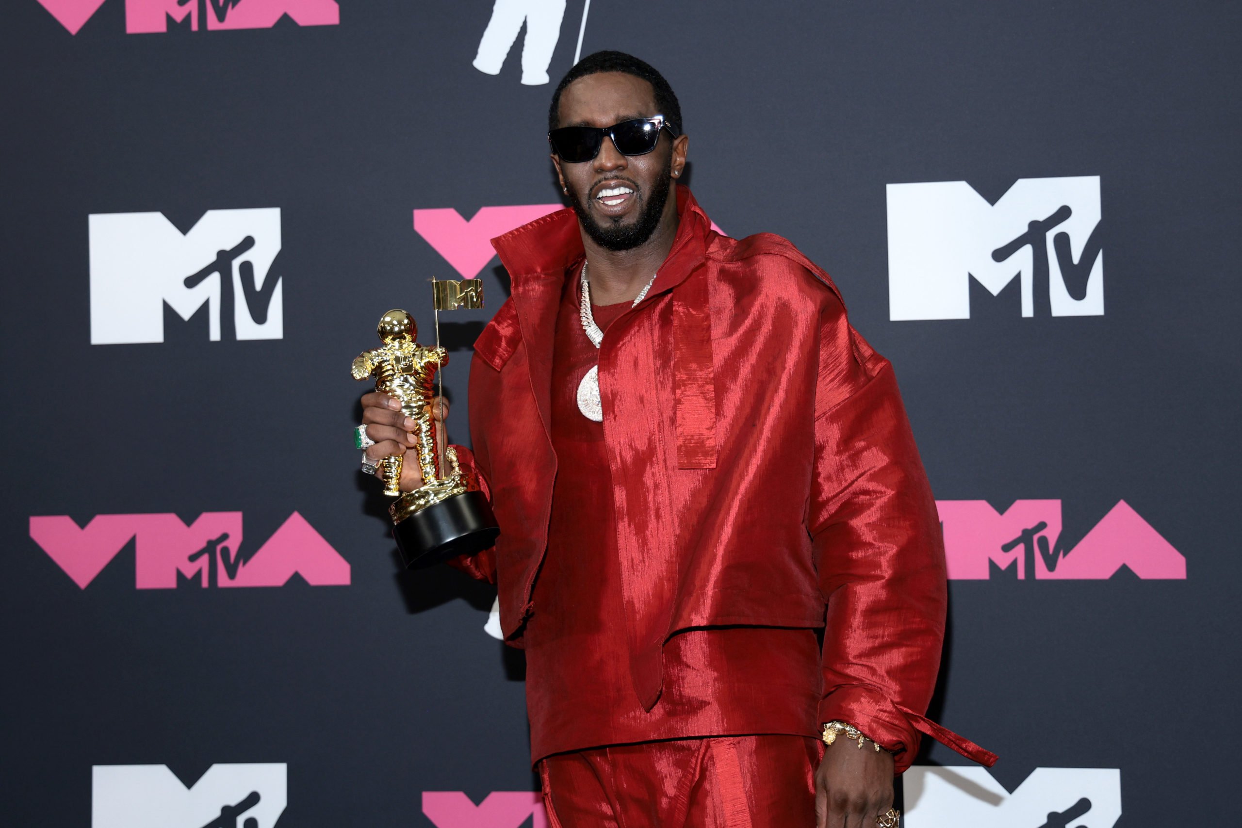 NEWARK, NEW JERSEY - SEPTEMBER 12: Diddy poses in the press room with his Global Icon Award at the 2023 MTV Video Music Awards at Prudential Center on September 12, 2023 in Newark, New Jersey. (Photo by Dimitrios Kambouris/Getty Images)