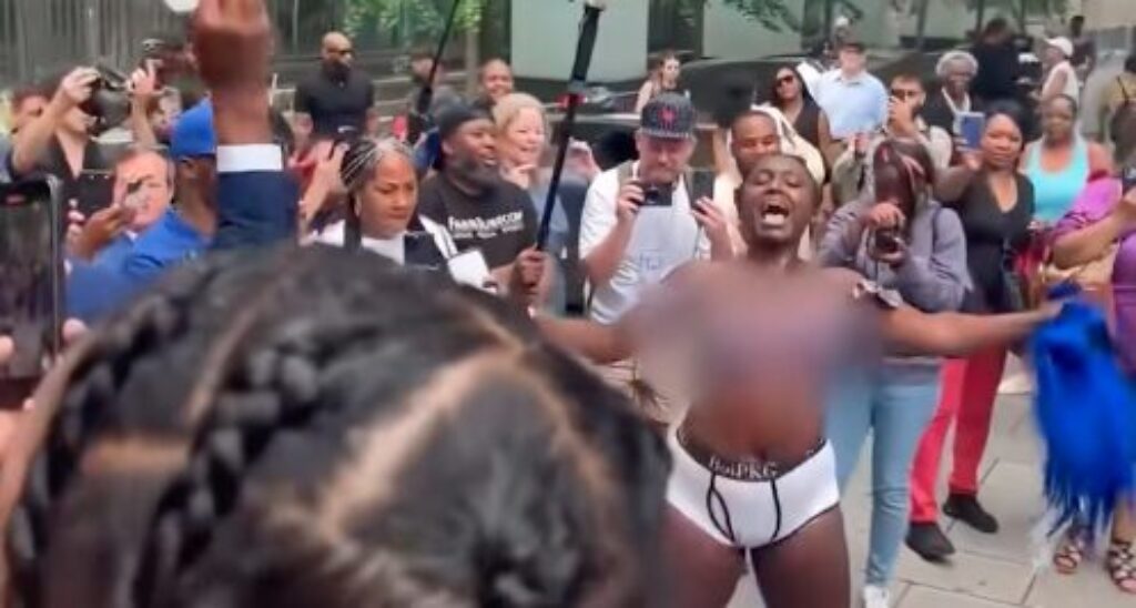 Diddy Fans Celebrate Verdict by Breaking Out Baby Oil Outside Courthouse – Glistening Nip Slip! [WATCH]