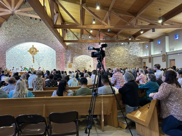 People pray during the memorial Mass for victims of catastrophic flooding in Texas at Notre Dame Catholic Church in Kerrville, Texas, on July 6, 2025. Credit: Sophie Abuzeid