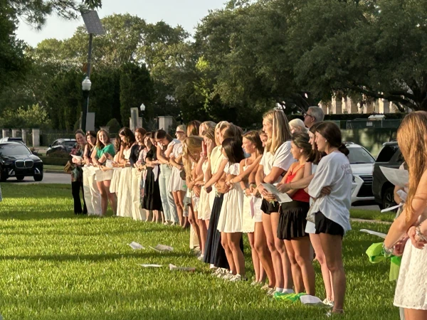 Camp Mystic alumnae sing songs after a memorial service at the Church of St. John the Divine in Houston on July 7, 2025. Credit: Amira Abuzeid/CNA