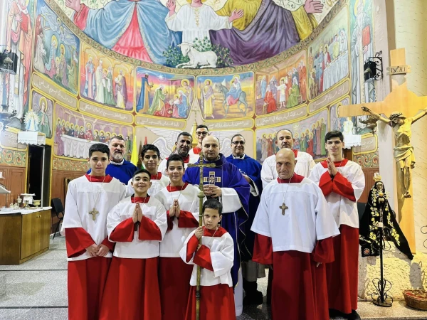 The priests of the Latin Parish of the Holy Family in Gaza with the group of altar servers. December 2024. Courtesy of Father Gabriel Romanelli