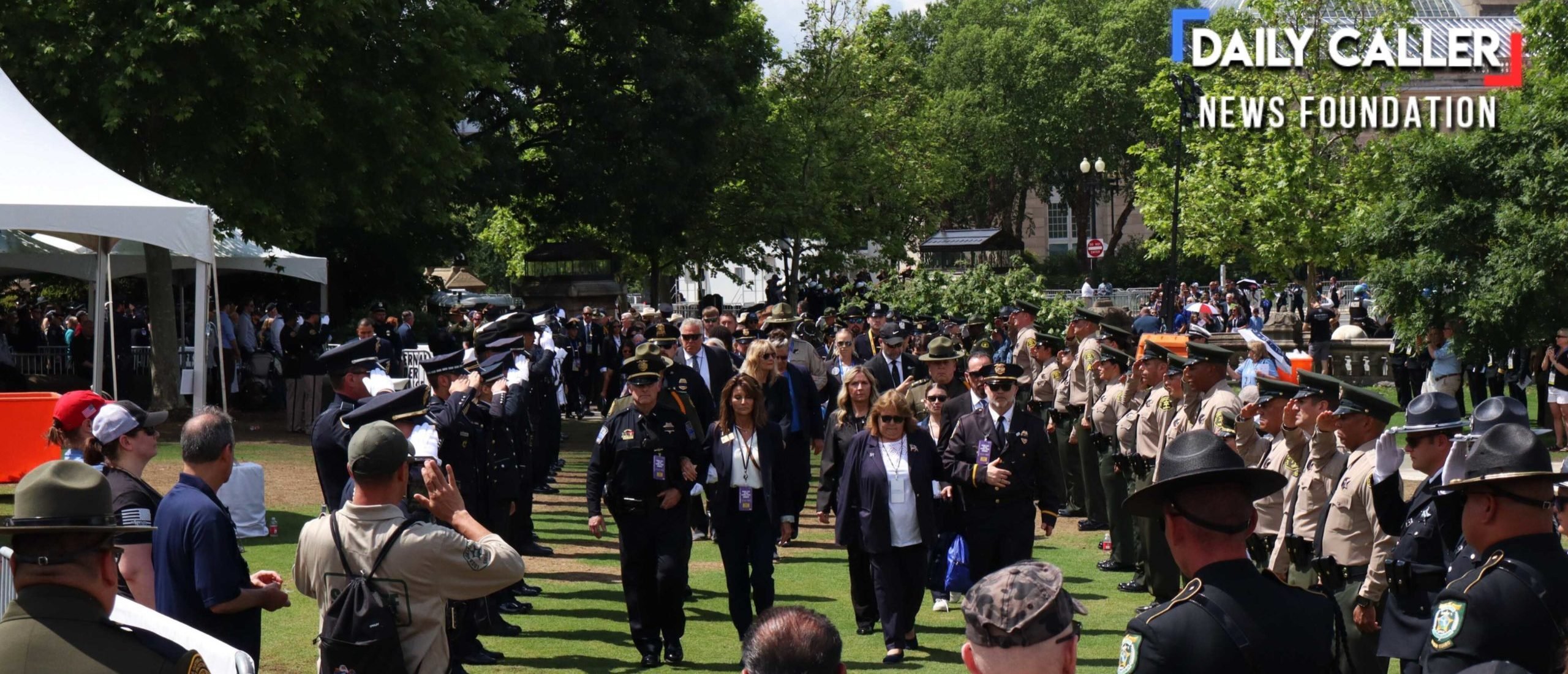 Uniformed "survivors" of the law enforcement profession and their families line up for a welcome at the National Peace Officers' Memorial Service on May 15, 2025 in Washington, D.C.