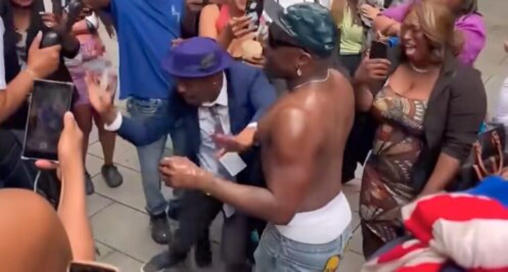 Diddy Fans Celebrate Verdict by Breaking Out Baby Oil Outside Courthouse – Glistening Nip Slip! [WATCH]