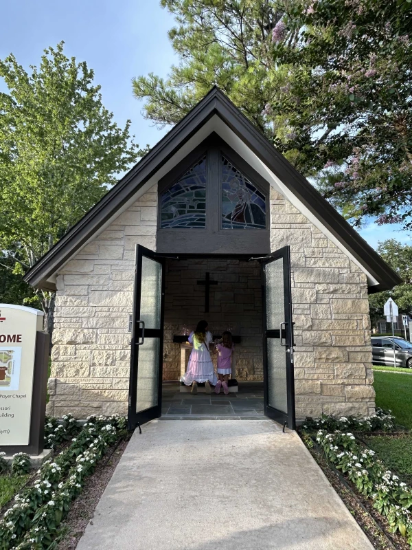 Mourners pray in a chapel outside of the Church of St. John the Divine in Houston on July 7, 2025, after a memorial service for the Camp Mystic girls who perished in the floods in central Texas last week. Credit: Amira Abuzeid/CNA