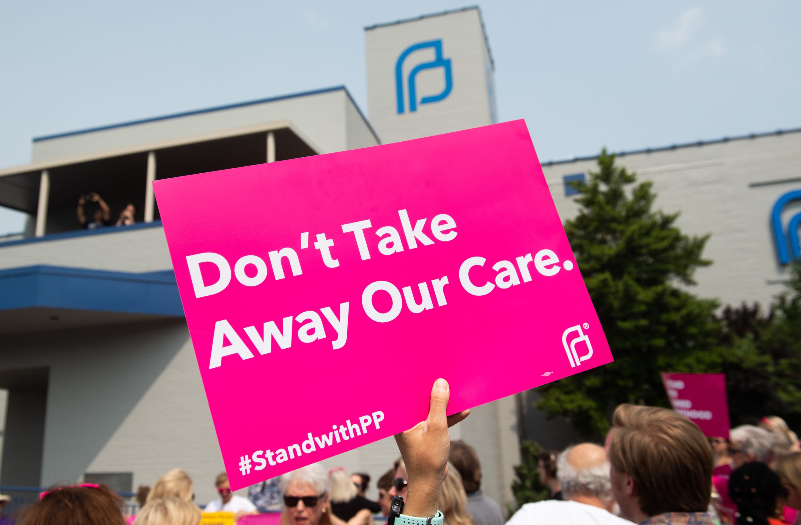 Pro-choice supporters and staff of Planned Parenthood hold a rally outside the Planned Parenthood Reproductive Health Services Center in St. Louis, Missouri, May 31, 2019, the last location in the state performing abortions, after a US Court announced the clinic could continue operating. - A US Court on May 31, 2019 blocked Missouri from closing the clinic. (Photo credit should read SAUL LOEB/AFP via Getty Images)