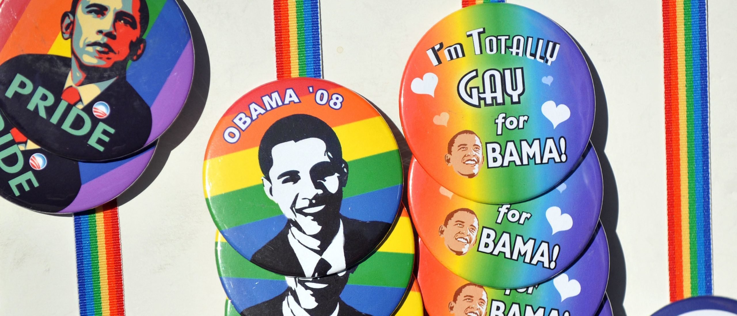 A vendor sells badges featuring pictures of US President-elect Barack Obama during a demonstration to condemn the ban of same-sex marriages in Los Angeles on November 15, 2008. (Photo by JEWEL SAMAD/AFP via Getty Images)