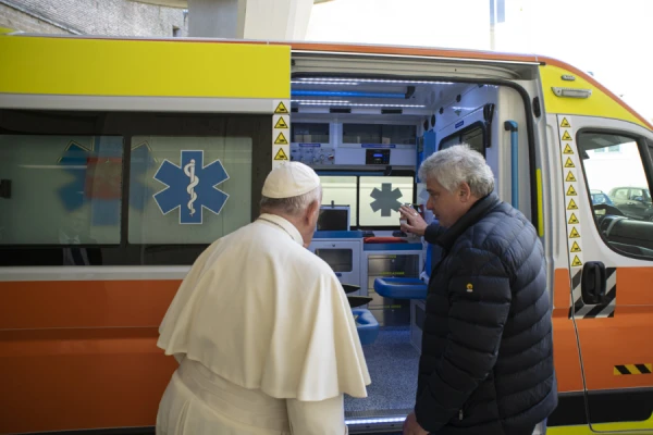 Pope Francis and Cardinal Konrad Krajewski with an ambulance bound for Ukraine. Vatican Media.