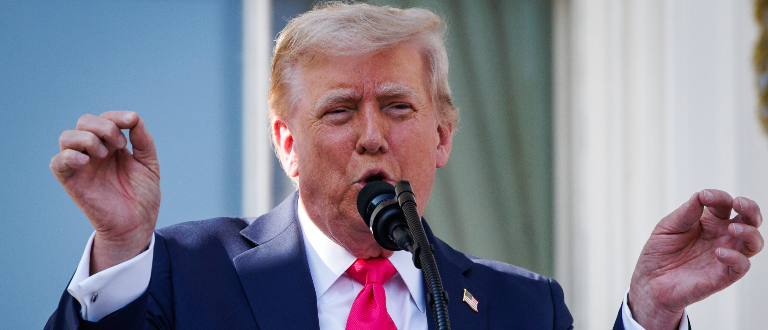 U.S. President Donald Trump, joined by first lady Melania Trump, delivers remarks during an Independence Day military family picnic on the South Lawn of the White House on July 04, 2025 in Washington, DC. (Photo by Samuel Corum via Getty Images)