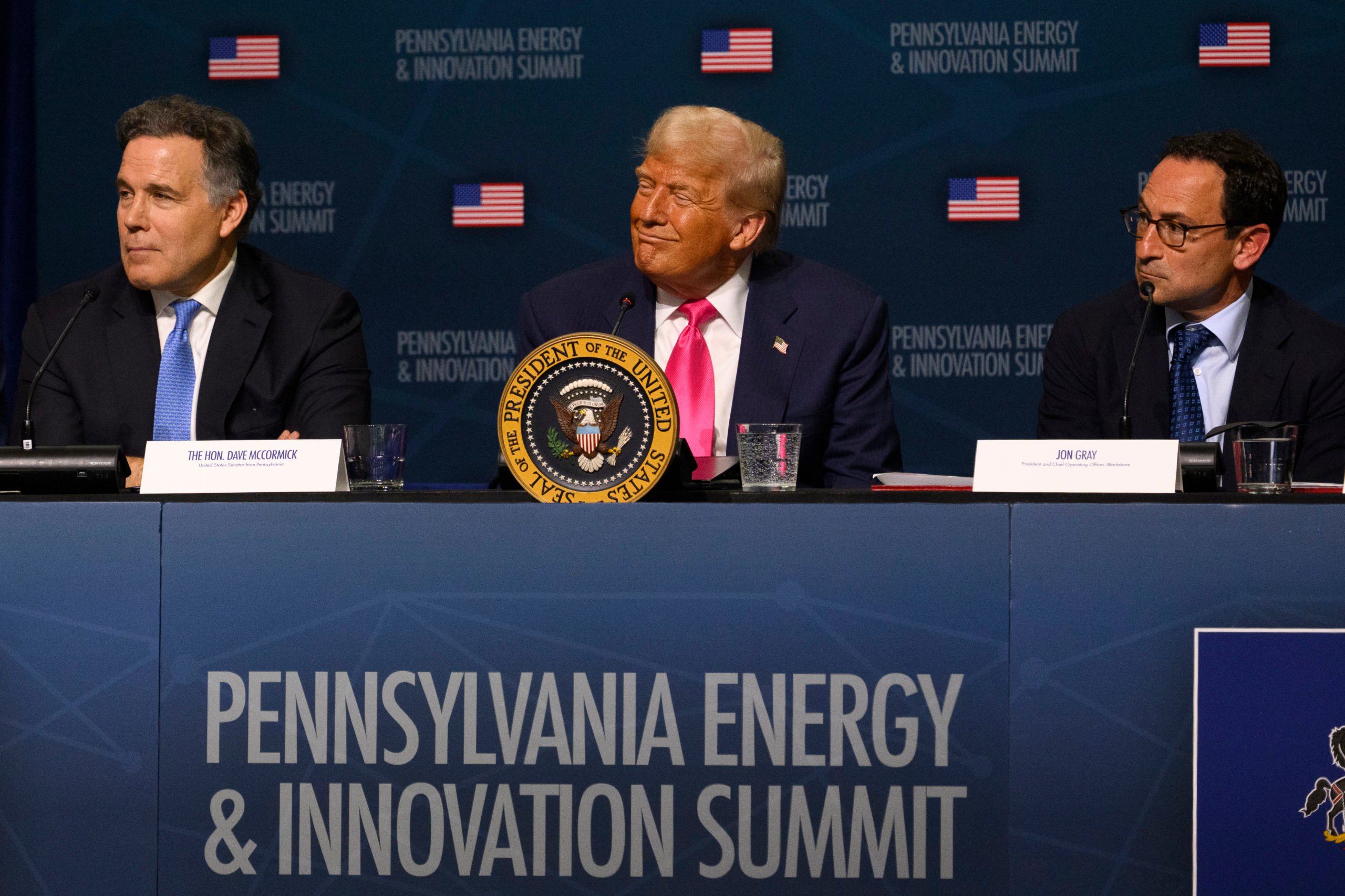 PITTSBURGH, PENNSYLVANIA - JULY 15: U.S. President Donald Trump (C) looks on during the inaugural Pennsylvania Energy and Innovation Summit at Carnegie Mellon University on July 15, 2025 in Pittsburgh, Pennsylvania. U.S. (Photo by Jeff Swensen/Getty Images)