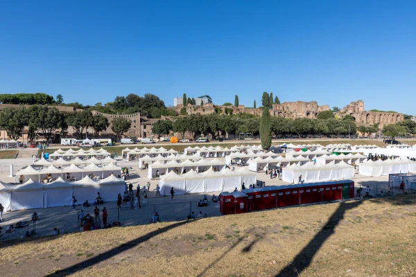 Booths stretch out near the Circus Maximus during a reconciliation event in Rome, Friday, Aug. 1, 2025. Credit: Daniel Ibáñez/CNA