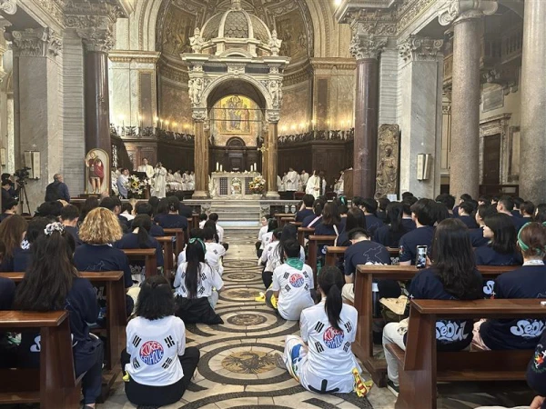 Young people listen during the Jubilee Mass in the Basilica of San Crisogono in Trastevere offered by Cardinal Andrew Yeom Soo-jung on July 31, 2025. Credit: Courtney Mares/CNA