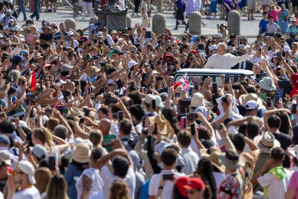 Pope Leo XIV waves from the popemobile to crowds gathered for his Wednesday general audience on Aug. 6, 2025, in St. Peter’s Square at the Vatican. Credit: Daniel Ibañez/CNA