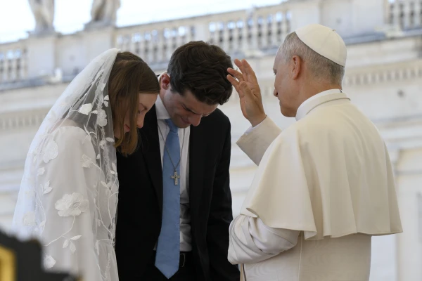 Pope Leo XIV blesses a newlywed couple during his Wednesday general audience on Aug. 6, 2025, in St. Peter’s Square at the Vatican. Credit: Vatican Media