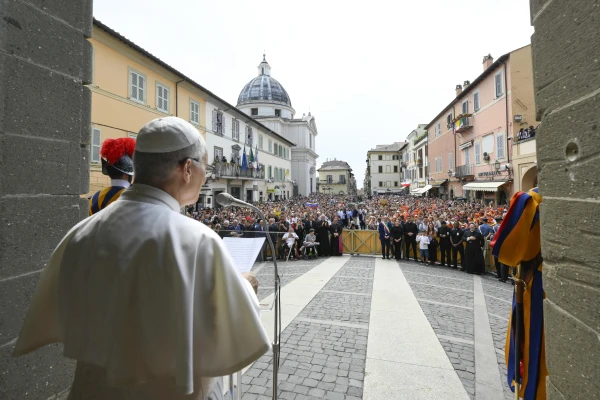 Pope Leo XIV greets visitors during the Angelus outside the Church of St. Thomas of Villanova in Castel Gandolfo, Friday, Aug. 15, 2025. Credit: Vatican Media