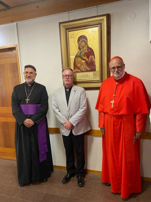 Father Benedict Kiely (center) with Cardinal Lars Anders Arborelius, OCD, and Father Idris Shabo at the blessing of the icon in the Syriac Catholic Church in Stockholm, Sweden, in July 2023. Credit: Photo courtesy of Father Benedict Kiely