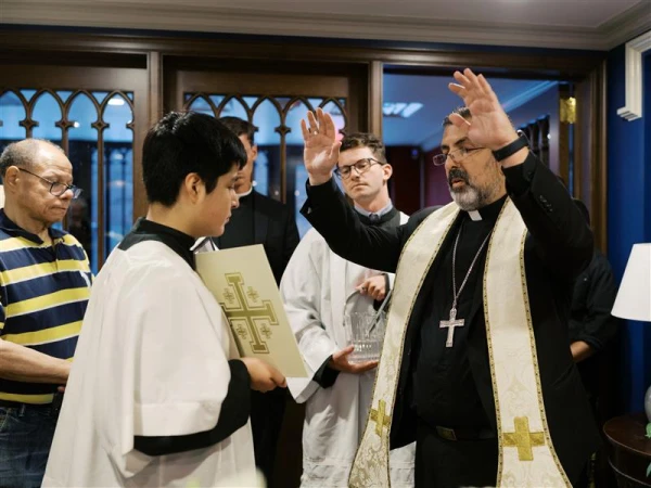 Bishop Juan R. Esposito-Garcia, auxiliary bishop for the Archdiocese of Washington in the District of Columbia and Southern Maryland, blesses the new Frassati Chapel, which is part of Immaculate Conception Parish, on Aug. 9, 2025. Credit: Steve and Bernadette Dalgetty
