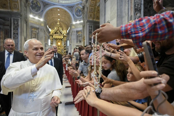 Pope Leo XIV blesses rosaries in St. Peter’s Basilica during the general audience on Wednesday, Aug. 20, 2025, at the Vatican. Credit: Vatican Media