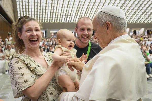 Pope Leo XIV greets a young pilgrim at the general audience in the Paul VI Audience Hall, Vatican City, Wednesday, Aug. 27, 2025. Credit: Vatican Media