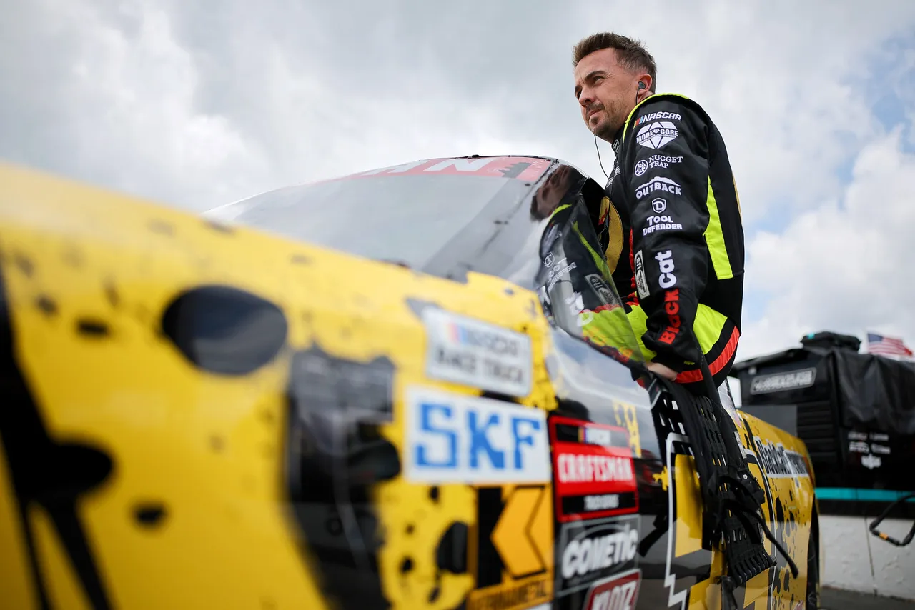 LONG POND, PENNSYLVANIA - JUNE 20: Frankie Muniz, driver of the #33 Black Cat Fireworks Ford, enters his truck to practice for the NASCAR Craftsman Truck Series MillerTech Battery 200 at Pocono Raceway on June 20, 2025 in Long Pond, Pennsylvania. (Photo by Jonathan Bachman/Getty Images)