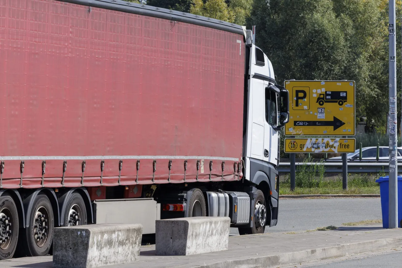 Protected truck parking sign pictured on a parking at the E40 highway in Wetteren, Sunday 17 August 2025. (Photo by NICOLAS MAETERLINCK/BELGA MAG/AFP via Getty Images)