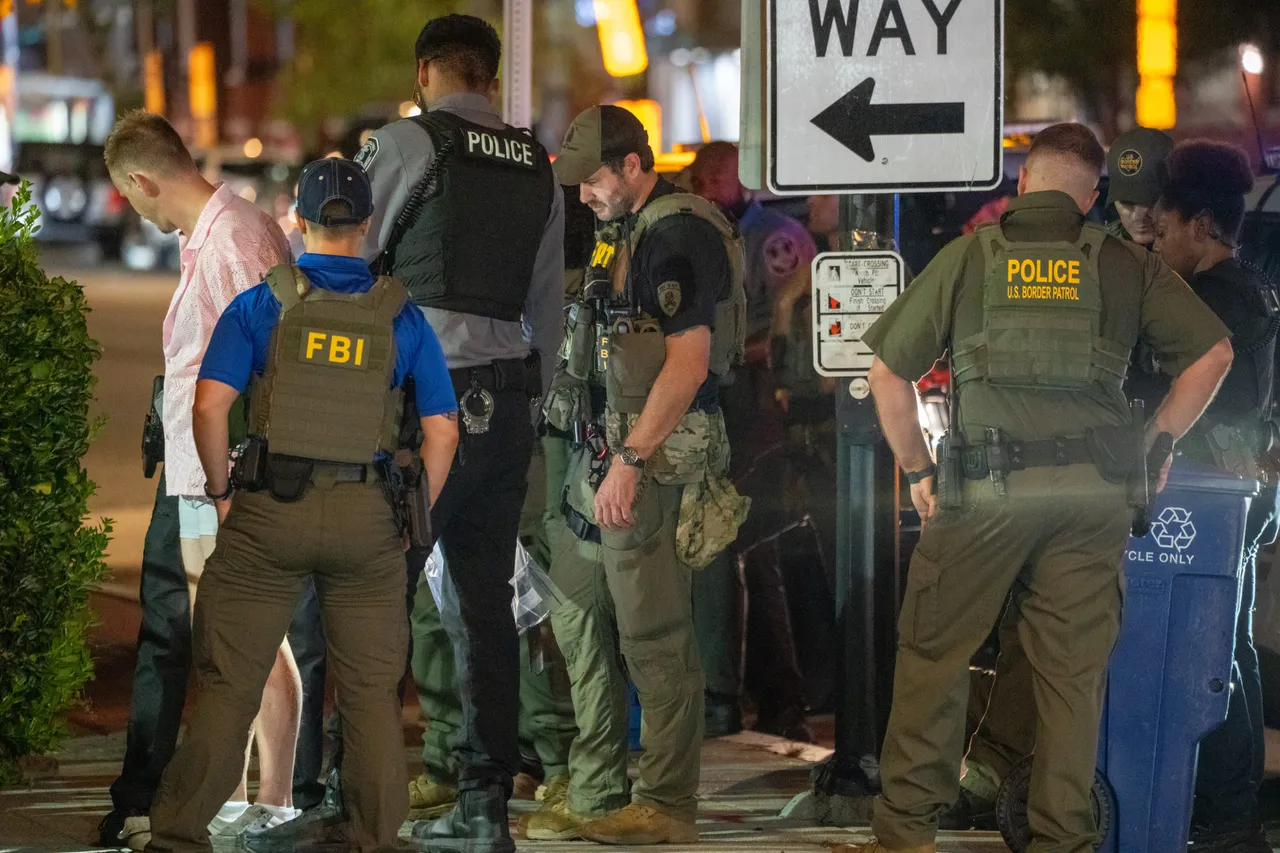 FBI and Border Patrol officers arrest a man, after he assaulted law enforcement with a sandwich, along the U Street corridor during a federal law enforcement deployment to the nation's capital on August 10, 2025 in Washington, DC. (Photo by Andrew Leyden/Getty Images)