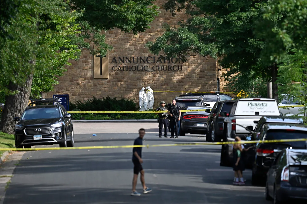MINNEAPOLIS, MINNESOTA - AUGUST 27: Police work the scene following a mass shooting at Annunciation Catholic School on August 27, 2025 in Minneapolis, Minnesota. According to Minneapolis Police, a gunman fired through the windows of the Annunciation Church at worshippers sitting in pews during a Catholic school Mass, killing two children and injuring at least 17 others. The gunman reportedly died at the scene from a self-inflicted gunshot wound. (Photo by Stephen Maturen/Getty Images)