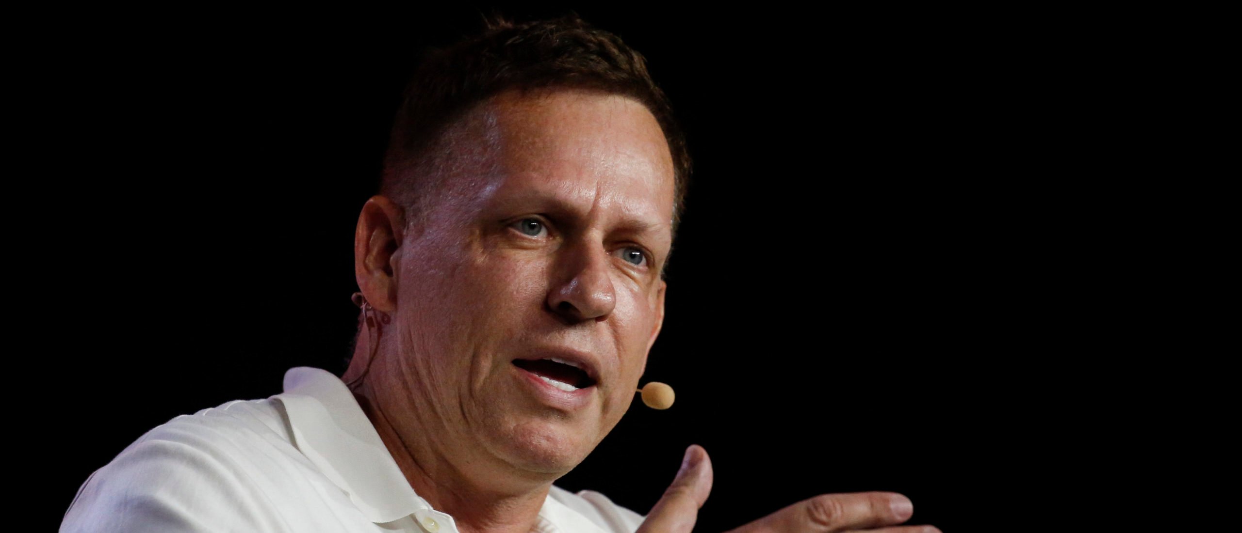 Peter Thiel, co-founder of PayPal, Palantir Technologies, and Founders Fund, gestures as he speaks during the Bitcoin 2022 Conference at Miami Beach Convention Center on April 7, 2022 in Miami, Florida. The worlds largest bitcoin conference runs from April 6-9, expecting over 30,000 people in attendance and over 7 million live stream viewers worldwide.(Photo by Marco Bello/Getty Images)