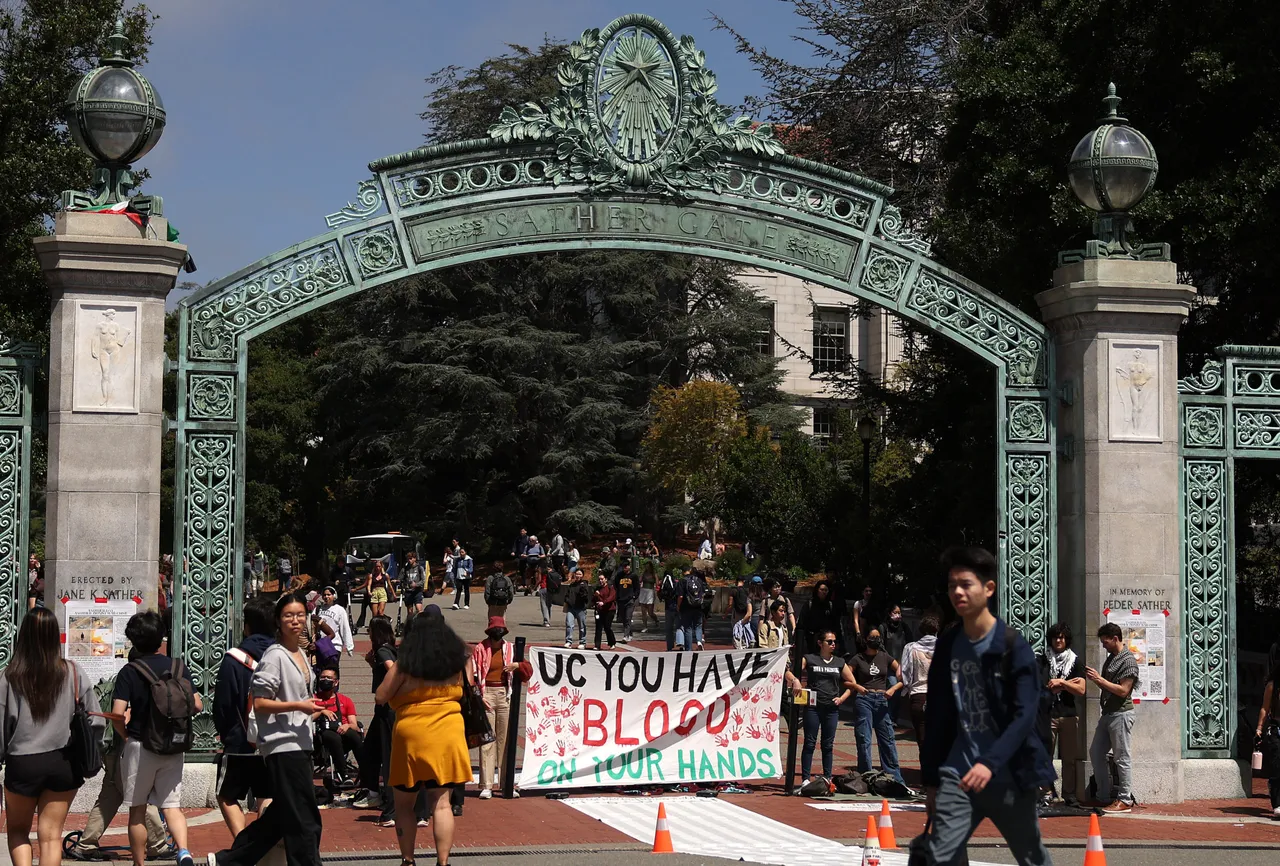 BERKELEY, CALIFORNIA - APRIL 22: Pro-Palestinian protesters stage a demonstration in front of Sather Gate on the UC Berkeley campus on April 22, 2024 in Berkeley, California. Hundreds of pro-Palestinian protesters staged a demonstration in front of Sproul Hall on the UC Berkeley campus where they set up a tent encampment in solidarity with protesters at Columbia University who are demanding a permanent cease-fire in the war between Israel and Gaza. (Photo by Justin Sullivan/Getty Images)