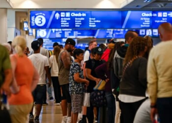 Woman Crashes Out In Orlando Airport With Kick To Employee, Punches Computers