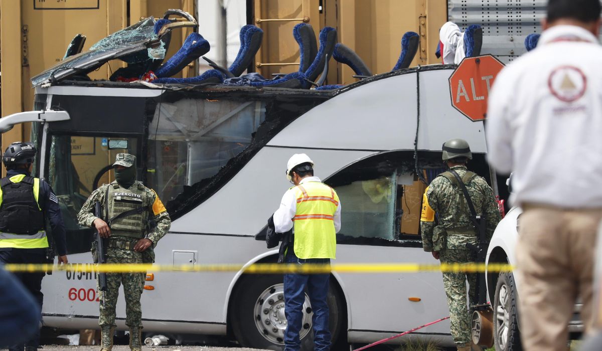 Train slams into a bus outside Mexico City and kills at least 10 people